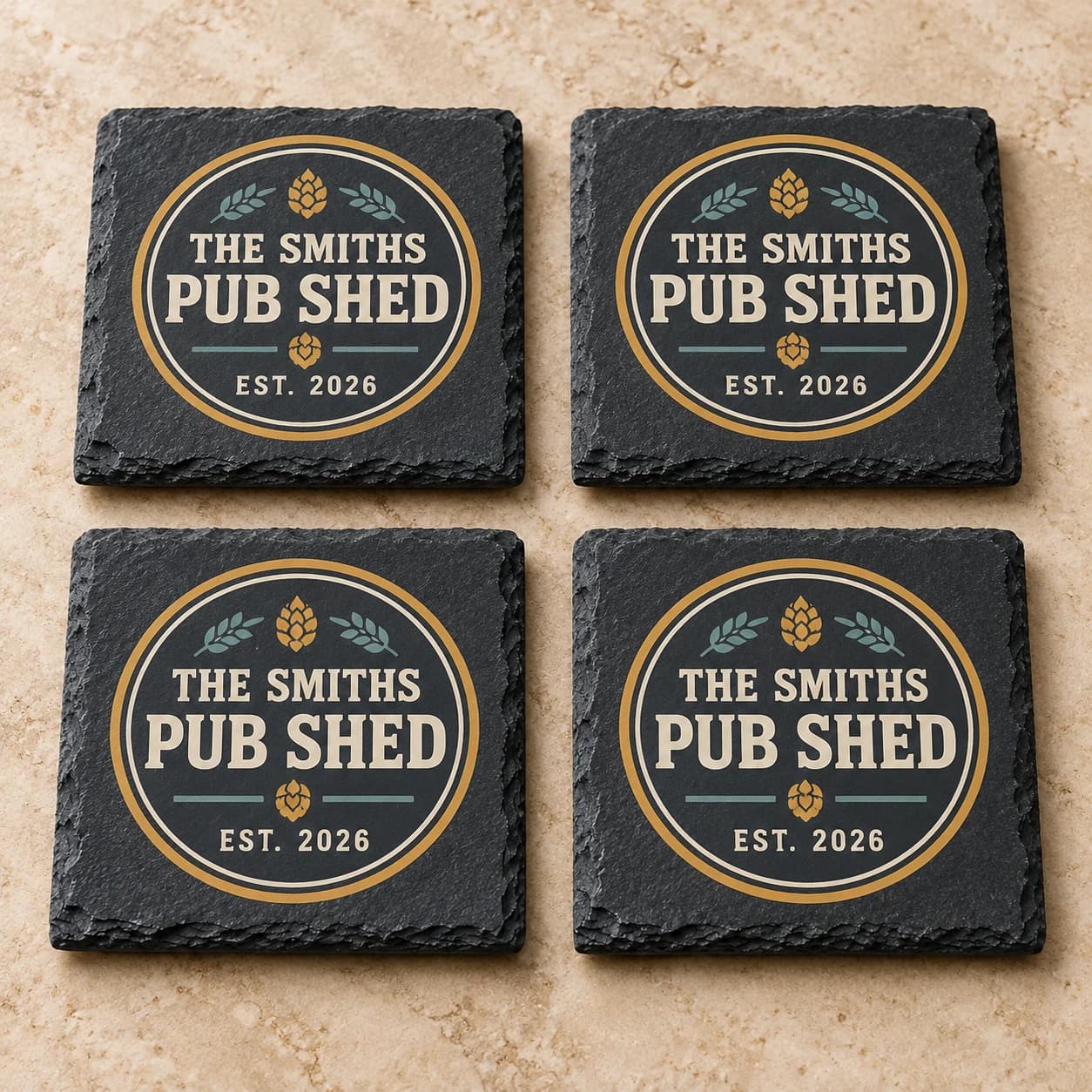 Digital product mockup of four personalised slate coasters with a pub shed design.